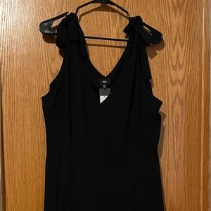 New with tags: Classic yet casual black dress.